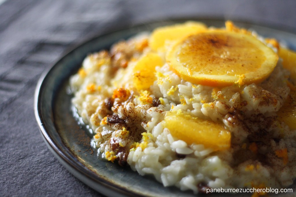 Risotto delle feste al finocchio, mascarpone, arancia, uvette, scorza di agrumi e polvere di&nbsp;liquirizia